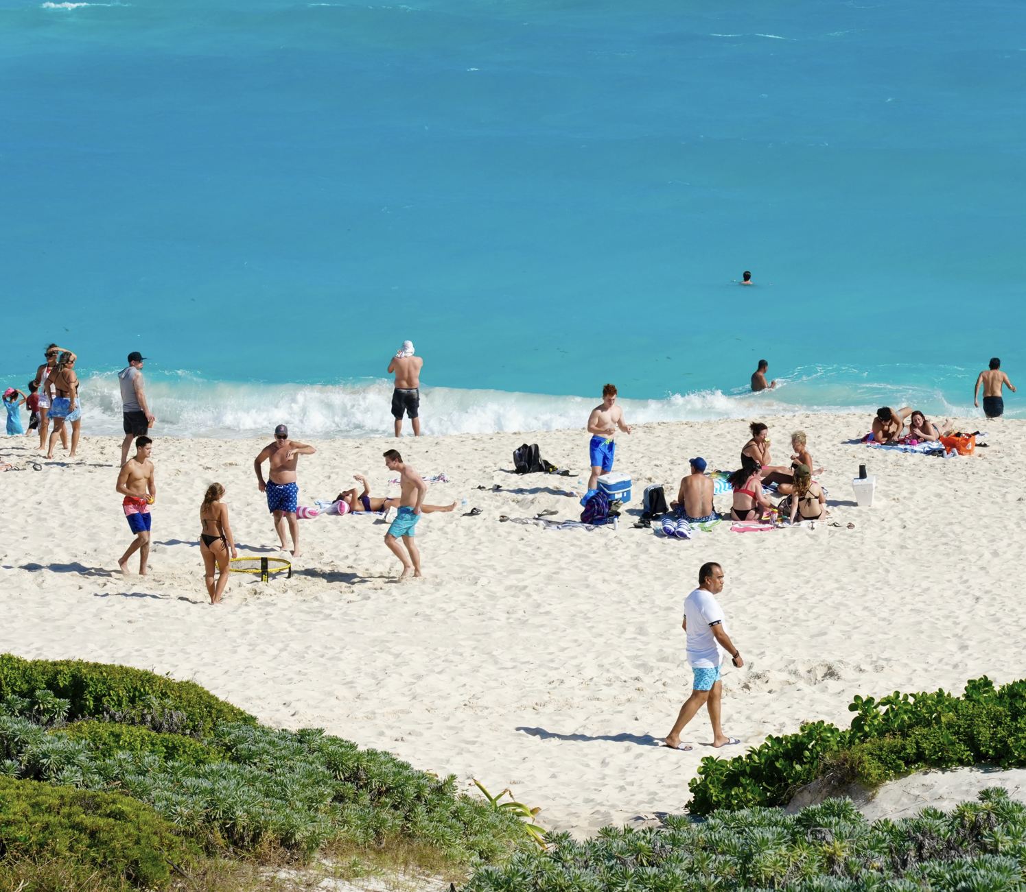 Turista de Cancún en la playa