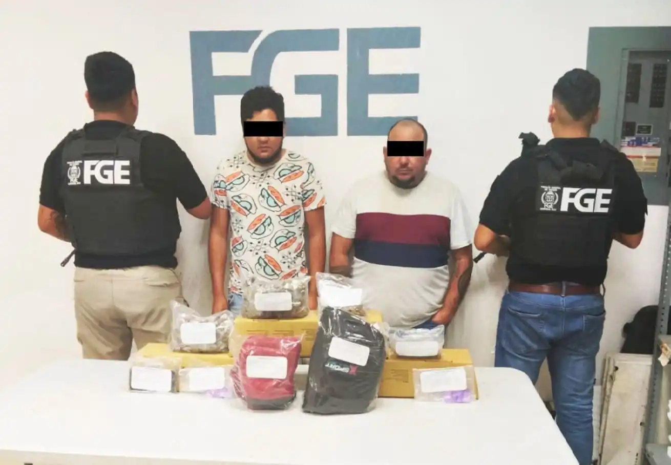 Detienen en Playa del Carmen pareja acusada de fraude en venta de vehículos